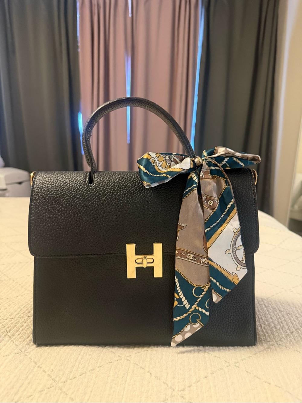 Structured Black Top-Handle Bag with Gold Hardware and Scarf Accent